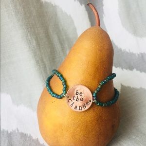 Hand stamped beaded bracelets.